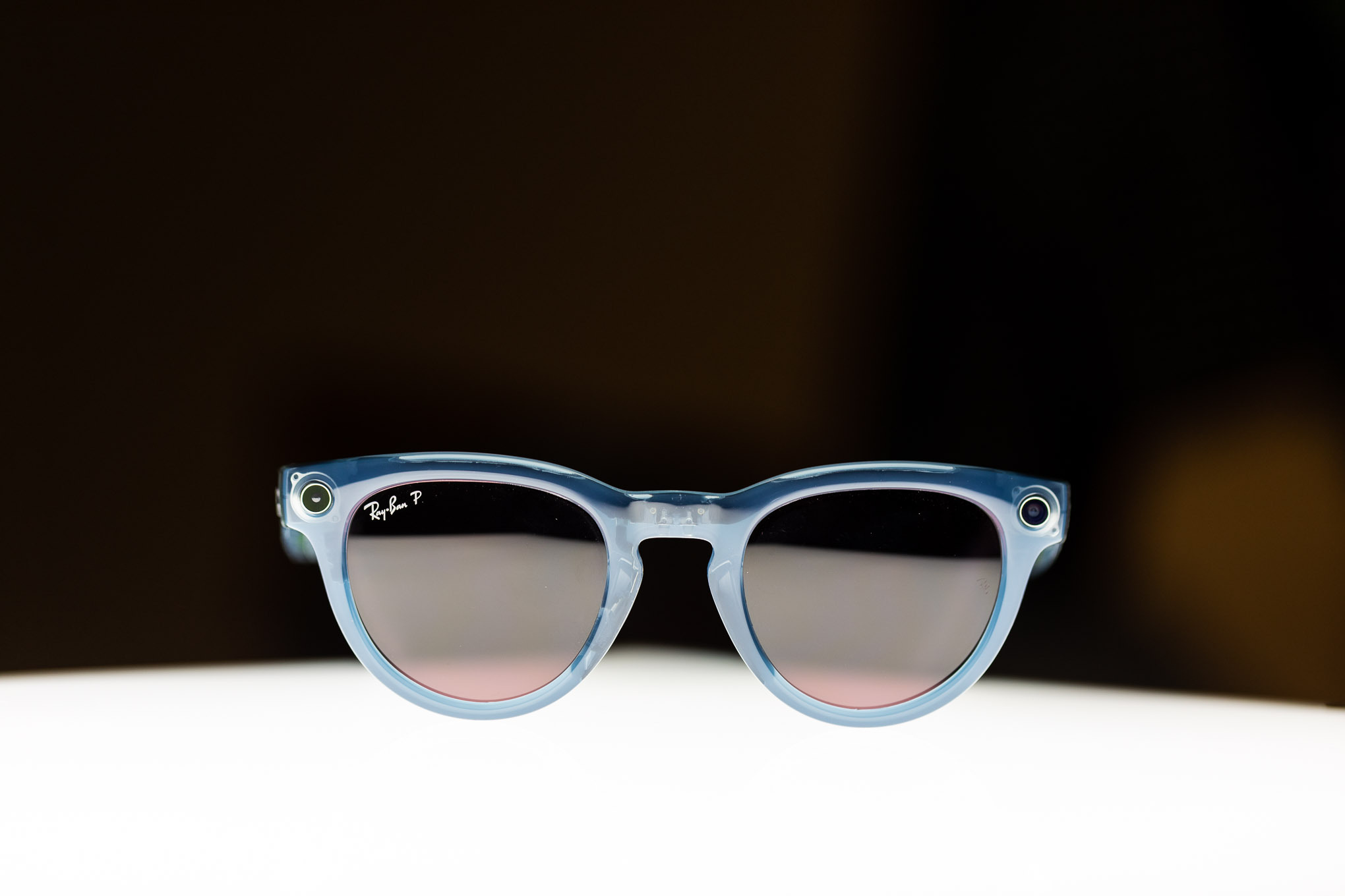 Close-up of Ray-Ban Meta smart glasses on an illuminated surface