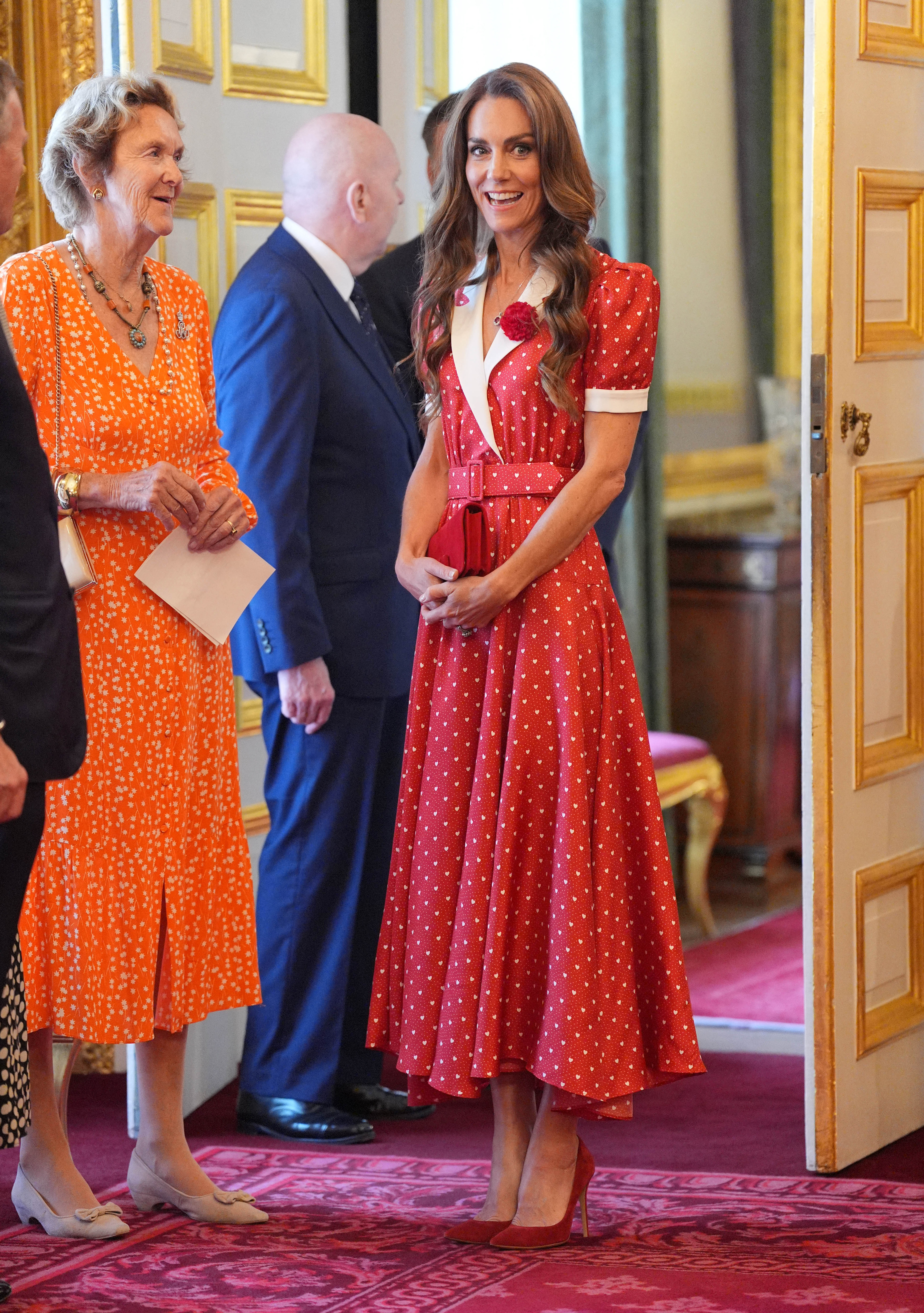 Kate Middleton wears a red dress