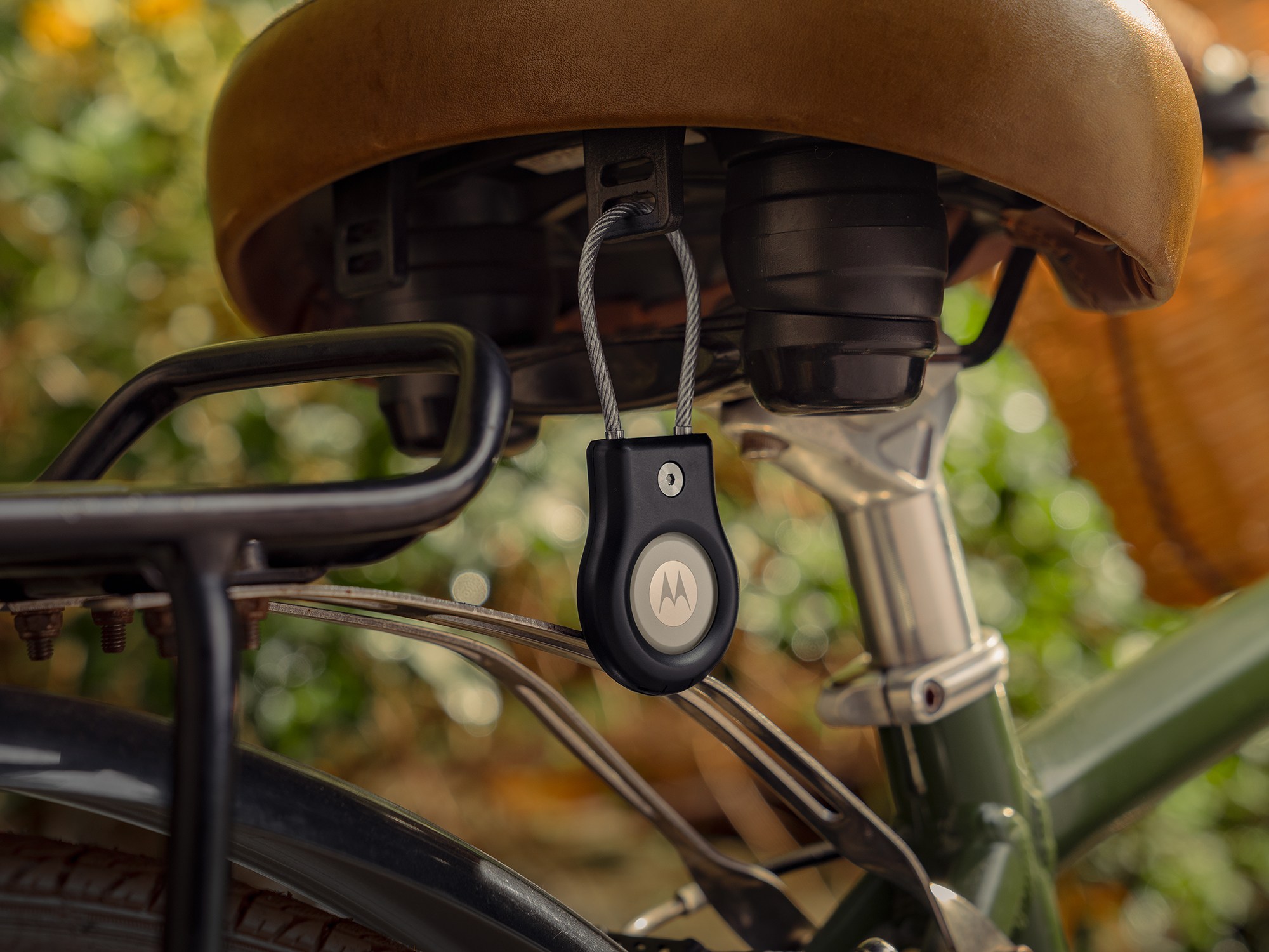 Moto Tag 2 on the back of a bicycle