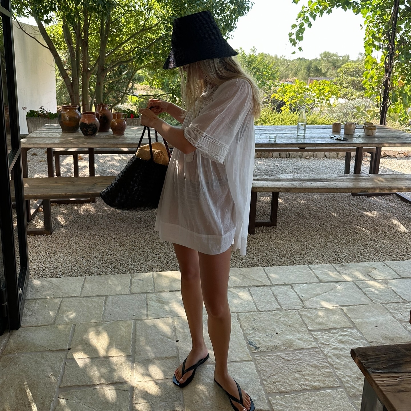 An image of @caitlinburnhamm wearing the A.Emery Kinto flip-flops.