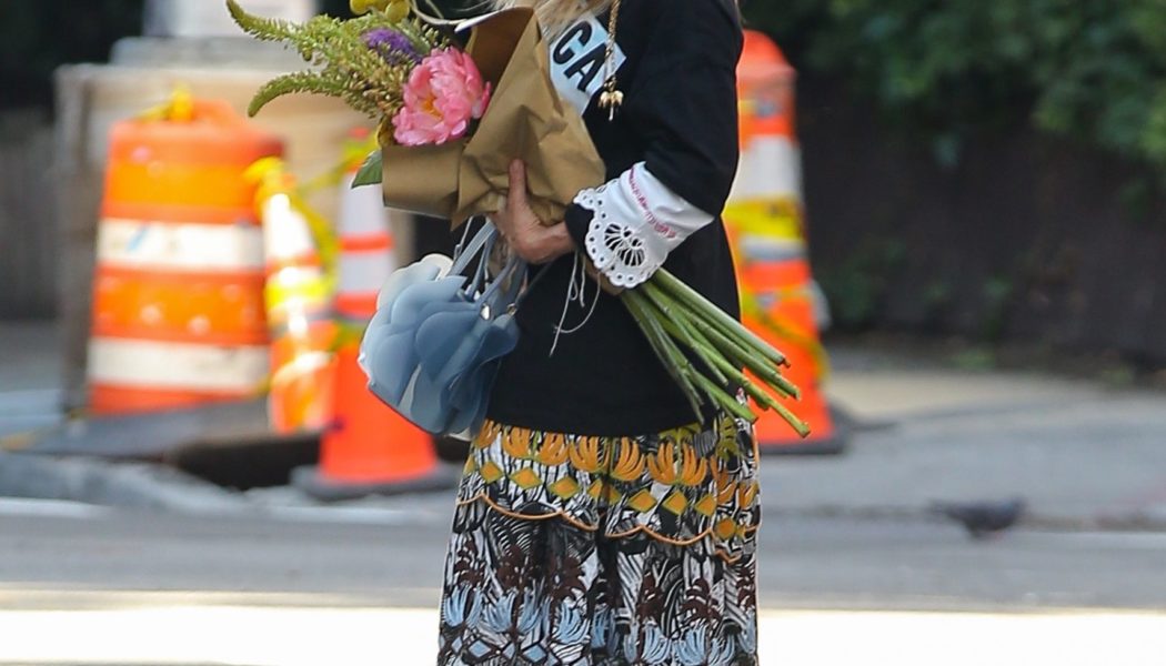 Not Sandals—This is The Shoe Trend Chic Over-50s are Wearing With Midi Skirts Right Now
