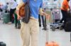 Not Sneakers: The Anti-Trend Flats It Girls at the Airport Are Wearing With Drawstring Pants