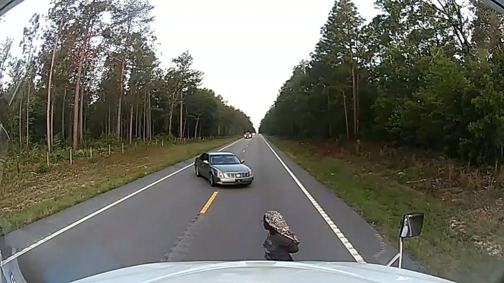 Anthony J. Moore Rescues Black Woman While Driving Truck
