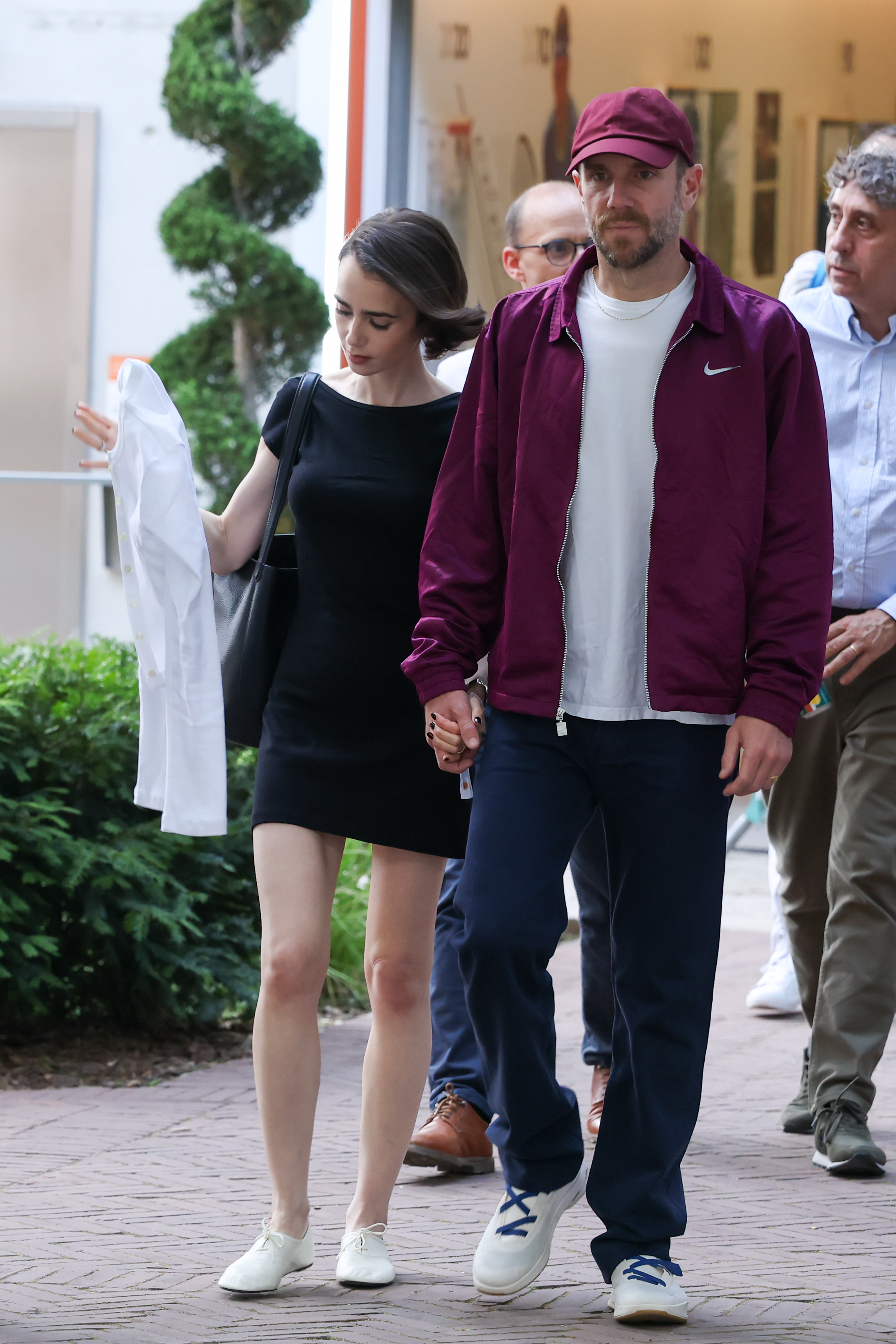 Lily Collins wears jazz shoes in Paris at the French Open