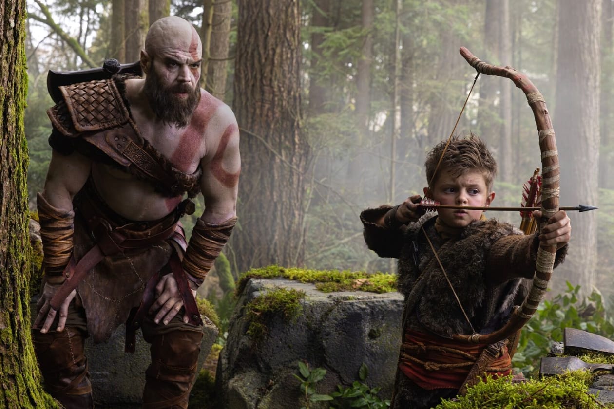 7 Most Exciting Video Game TV Adaptation in Development Right Now Warhammer 40,000 god of war Assassin's Creed netflix prime video crunchyroll Tomb Raider Cyberpunk: Edgerunners Arcane Ghost of Tsushima