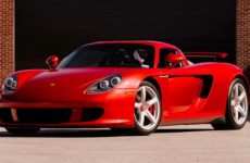 A Rare Porsche Carrera GT Finished in Ferrari’s 'Rosso Fuoco' Red Heads to Auction