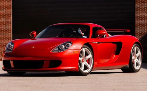A Rare Porsche Carrera GT Finished in Ferrari’s 'Rosso Fuoco' Red Heads to Auction