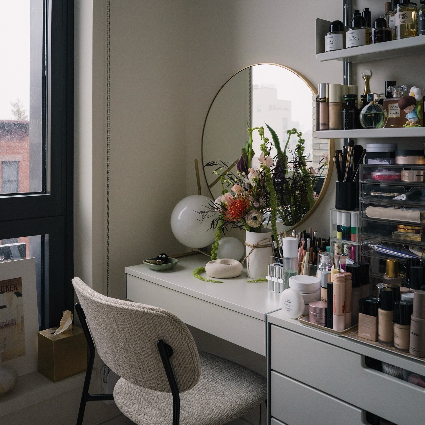 A vanity with skincare and makeup products