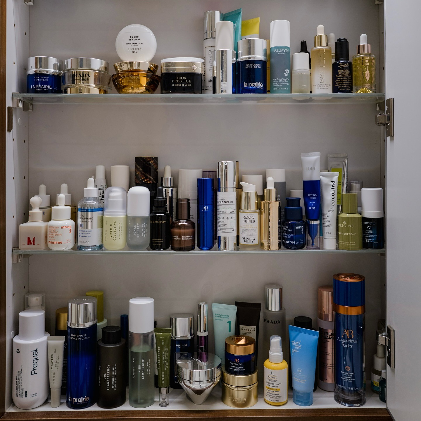 A medicine cabinet with luxury beauty products