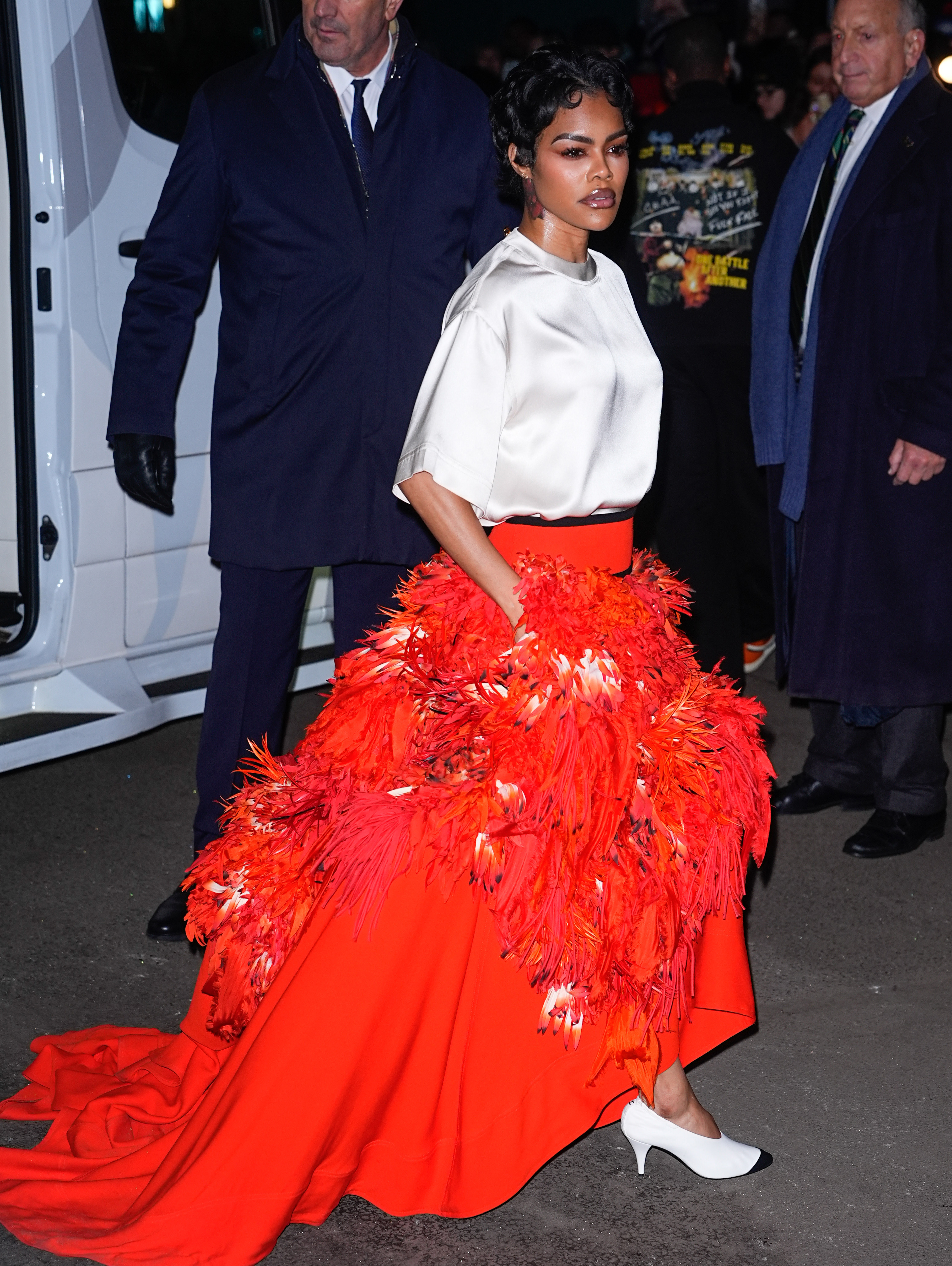 Teyana Taylor is seen arriving at the 35th Gotham Film Awards on December 1, 2025, in New York City, wearing a Chanel top, skirt, and cone heels.