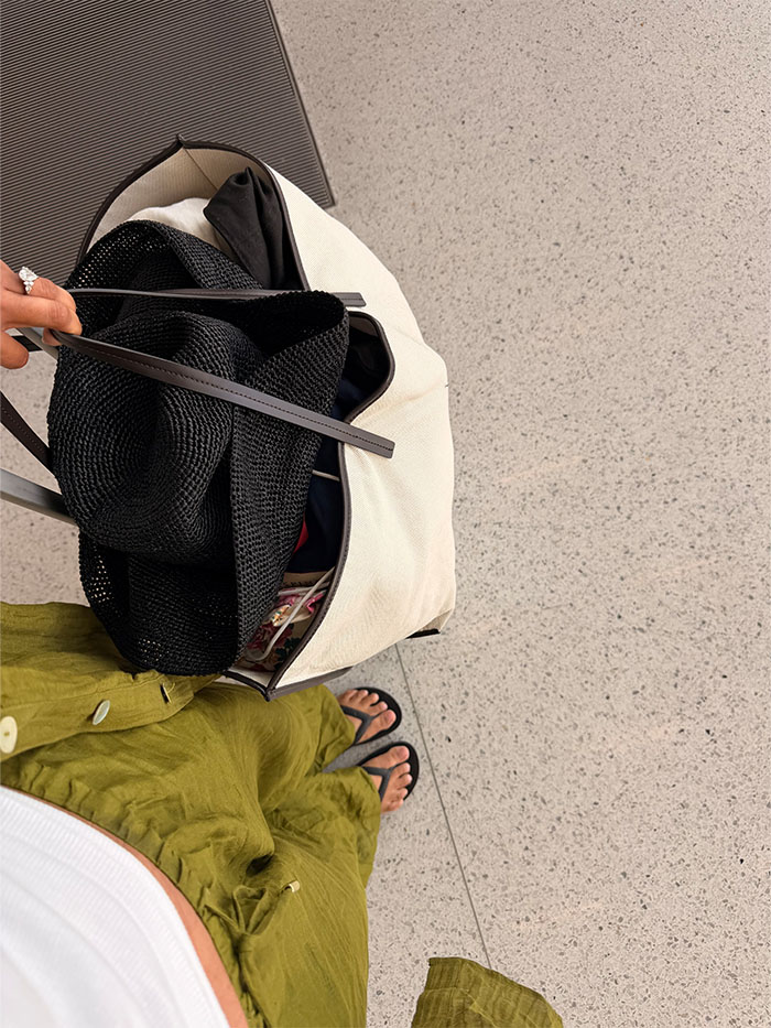 Jennifer Atilemile wearing a vacation outfit.