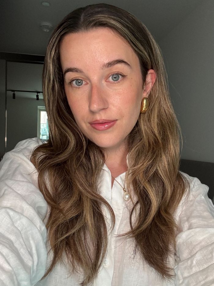 Deputy beauty editor Grace Lindsay testing the Rhode Highlight Milk