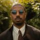 Michael B. Jordan Steals Hearts (and Art) in First Trailer for The Thomas Crown Affair