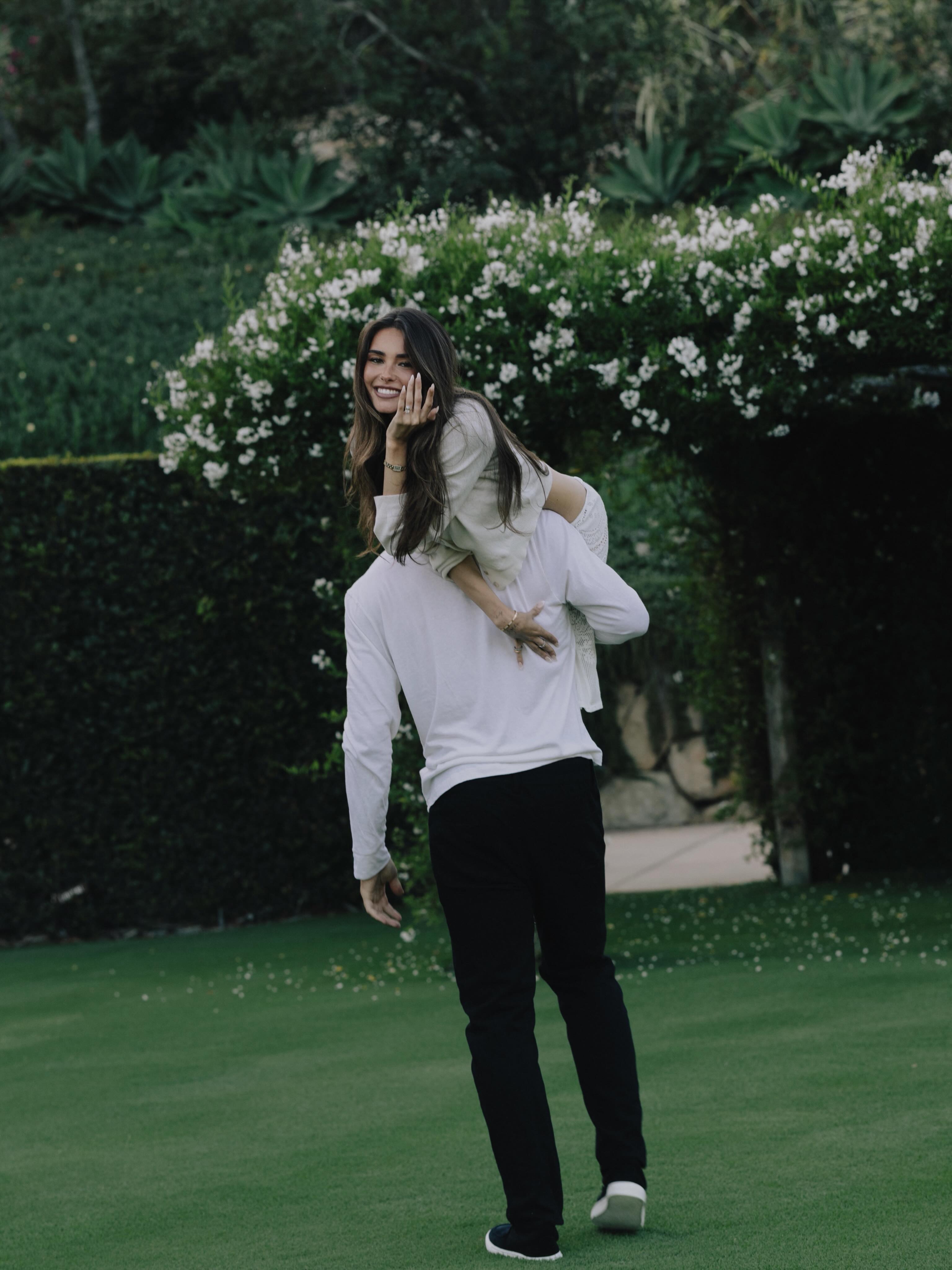 An image of singer Madison Beer and football player Justin Herbert following their engagement.