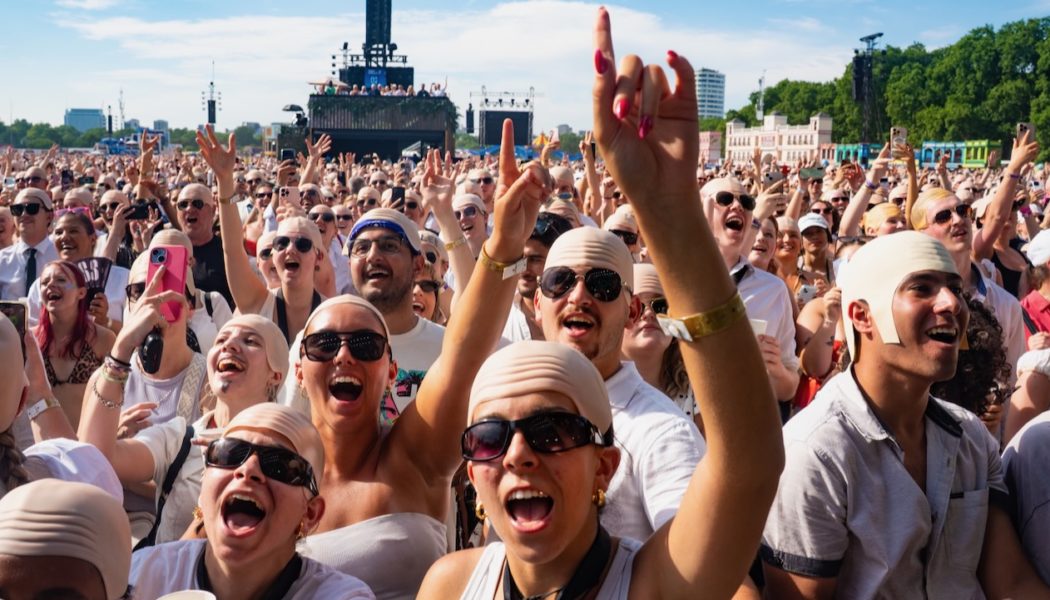 Pitbull Sets Guinness World Record for Largest Gathering of People in Bald Caps