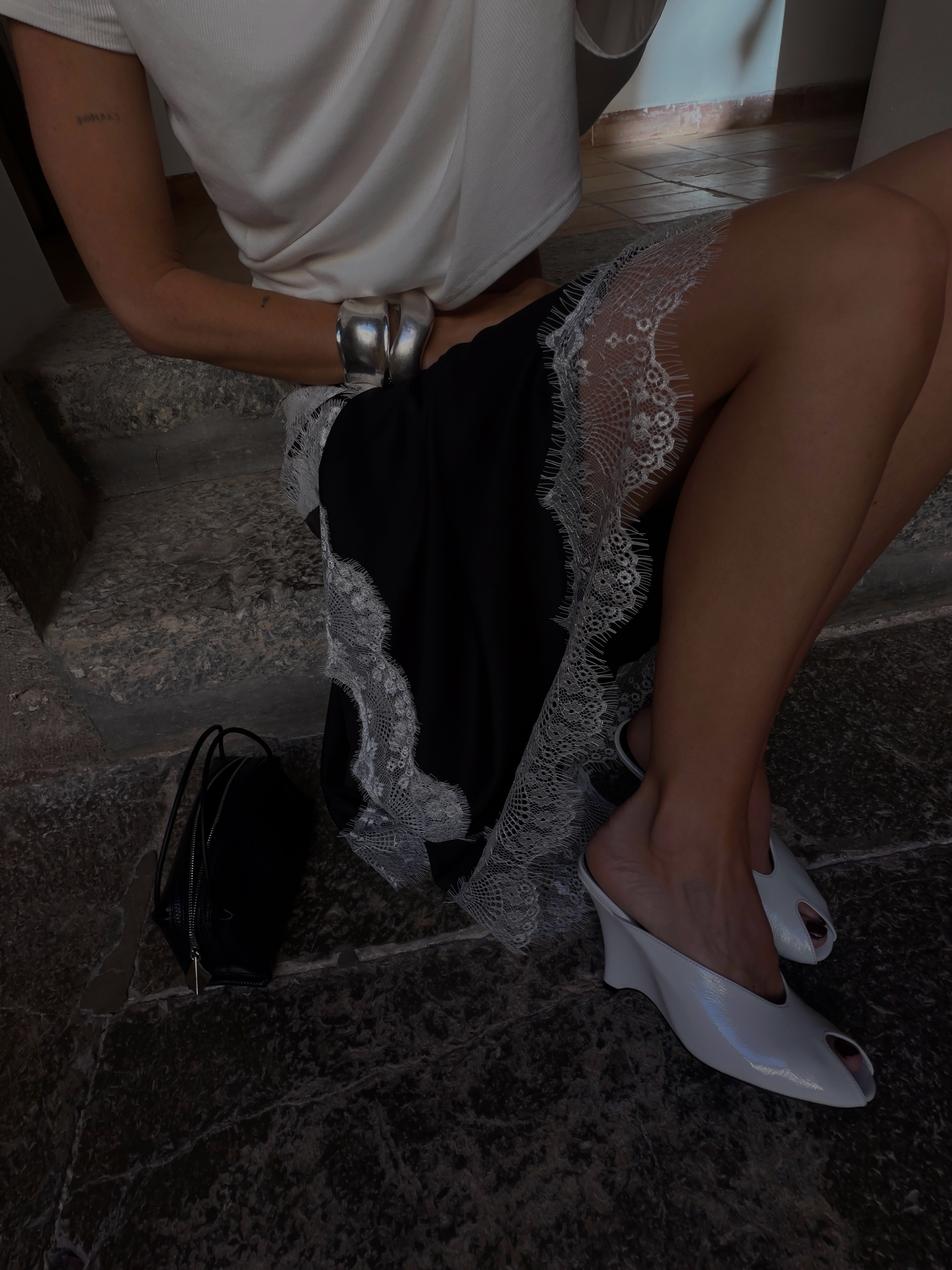 Hannah Lewis wears a lace trim skirt.