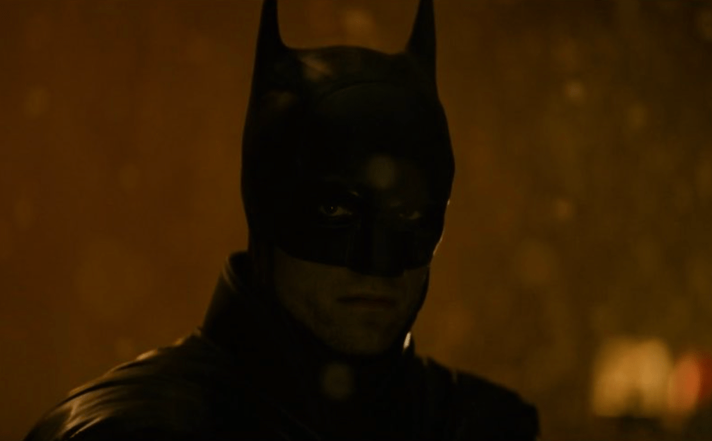 A close-up view of the Batman superhero character, with a dark, brooding expression on his face.