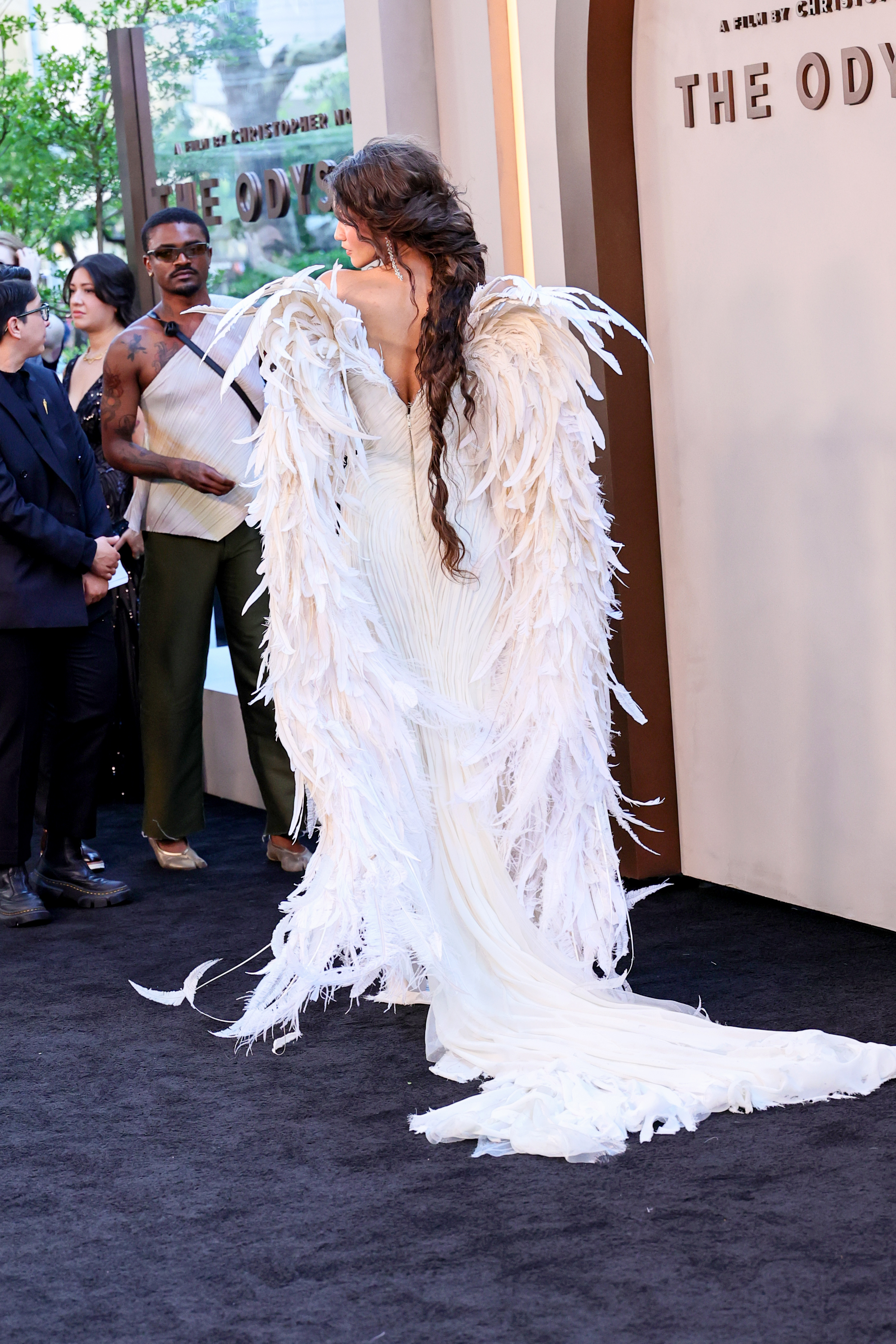 Zendaya wears white wings on the red carpet