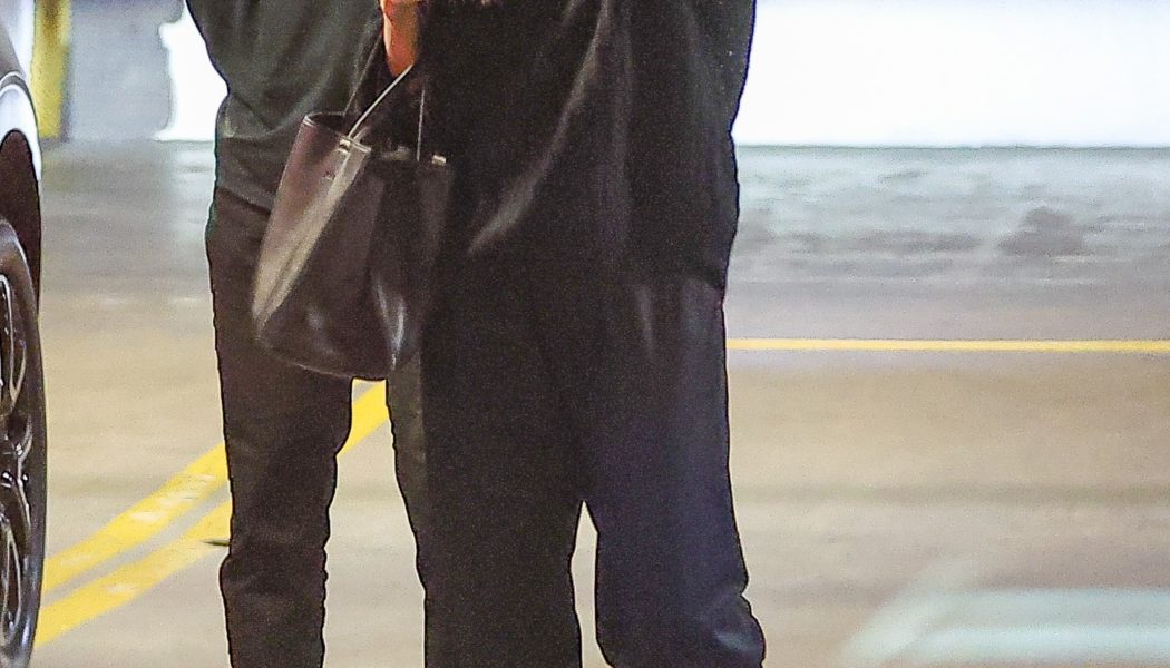 Chic Over-50s Are Styling Black Trousers With This Elegant Shoe Trend