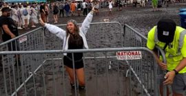 Lollapalooza Grounds Trap Woman in Knee-Deep Mud Pit