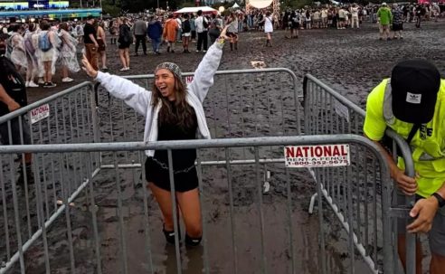 Lollapalooza Grounds Trap Woman in Knee-Deep Mud Pit