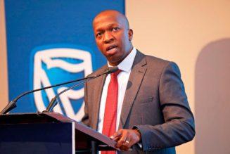 Stanbic cuts interim dividend in race for capital to lift growth